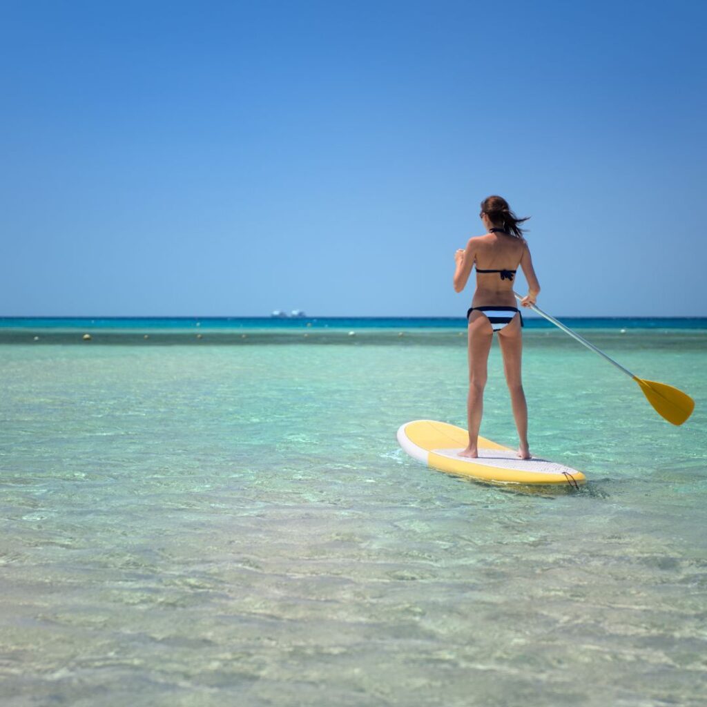 Les bienfaits du stand up paddle pour une gymnaste. Garder la ligne et rentrée dans son justaucorps